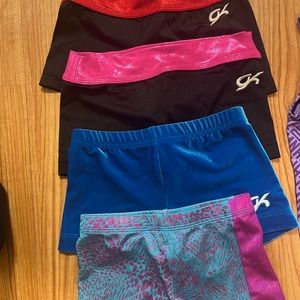 Little girl gymnastic leotards and shorts leotards are size 10, shorts are XS